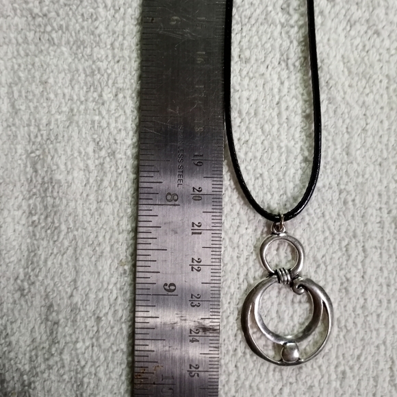 Silvertone swirl necklace on black cord - Picture 2 of 5